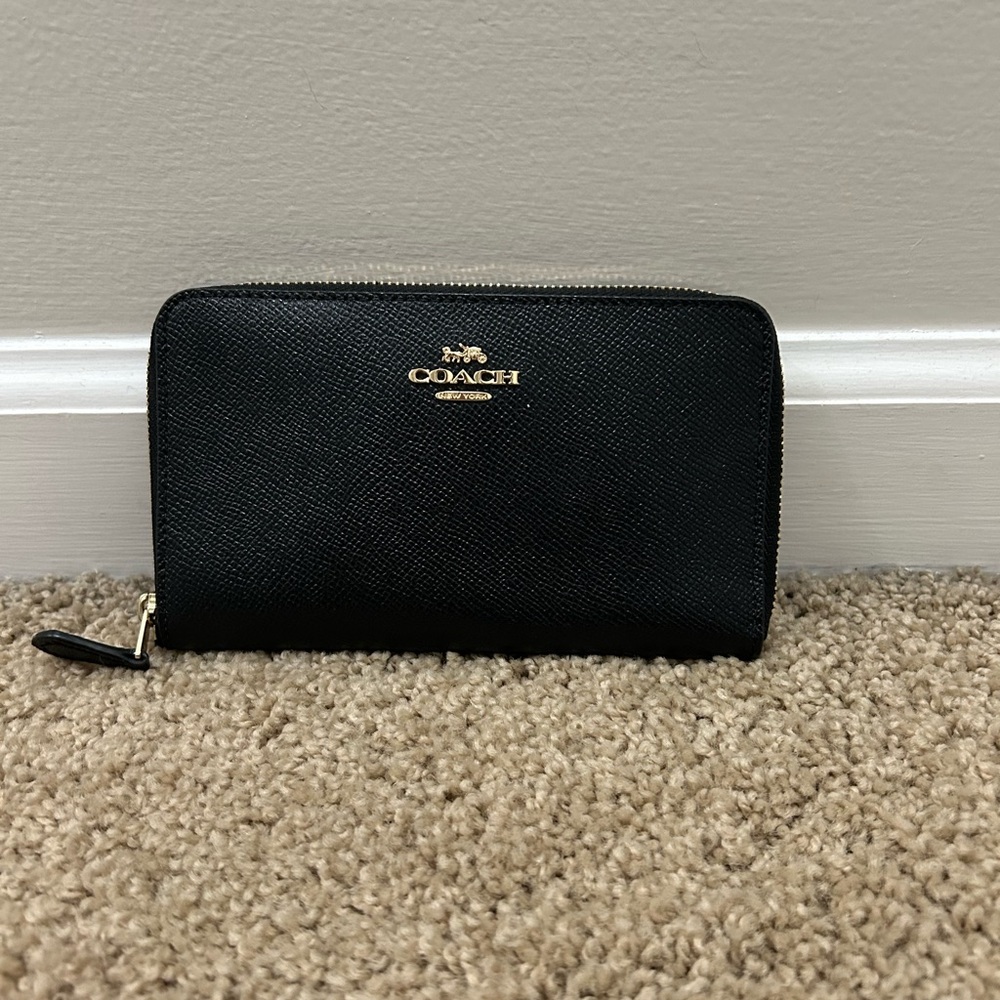 Coach Black Leather Wallet with Gold Accents